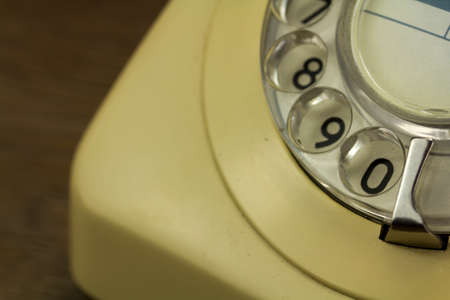 Old well used retro style rotary telephoneの写真素材
