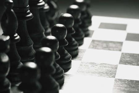 Wooden chess set with a game being played
