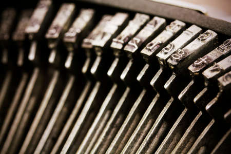 Close up of keys on an old vintage type writer. Retro filter applied.の写真素材
