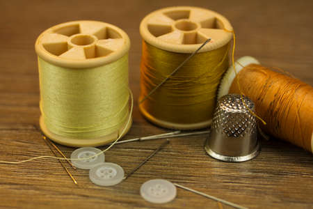 Close up of various bit of sewing equipment