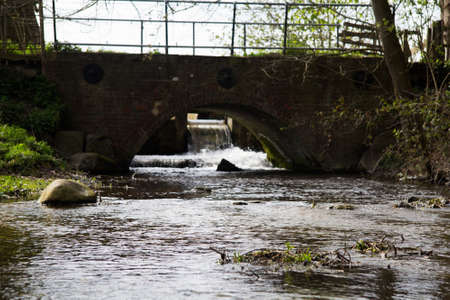 Stone bridge over a steam in the Chilterns, Englandの写真素材