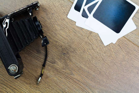 Overhead view of an old fashioned vintage bellows cameraの写真素材