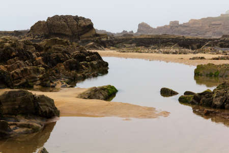 Rocks on the shore in Bude, Cornwall