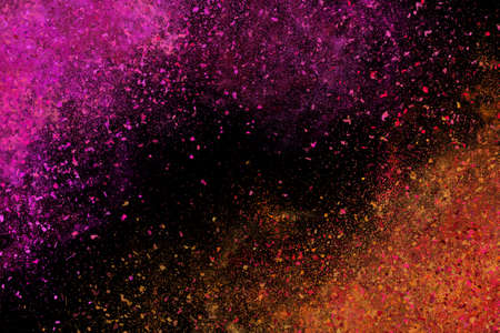 Colourful abstract powder explosion on a black background
