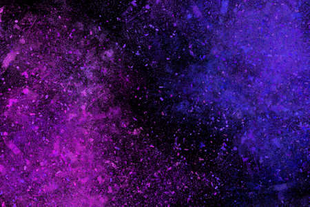 Colourful abstract powder explosion on a black backgroundの写真素材
