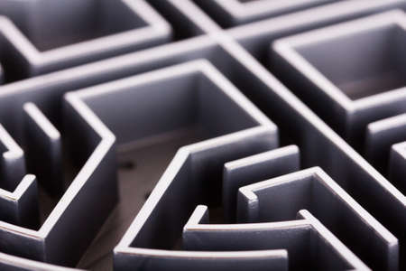 Close up of a grey labyrinth or maze puzzleの写真素材