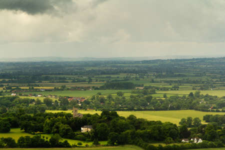 View over a church in the Chilterns, Buckinghamshire, Englandの写真素材