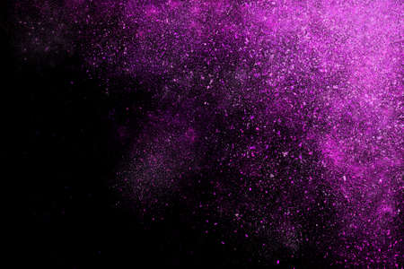 Colourful abstract powder explosion on a black background designの写真素材