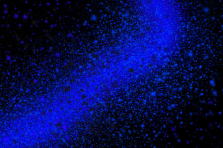 Colourful abstract powder explosion on a black background design