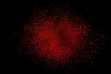 Colourful abstract powder explosion on a black background design