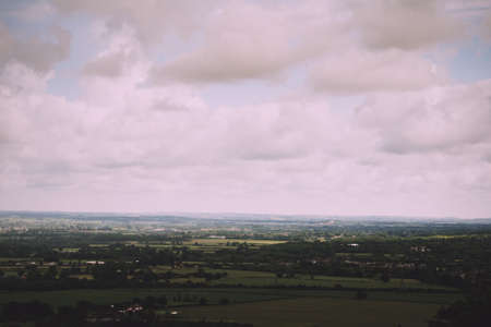 Cloudy view over the Chilterns in Buckinghamshire, England Vintage Retro Filter.の写真素材