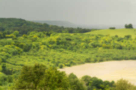 Cloudy view over the Chilterns in Buckinghamshire, England Out of focus.