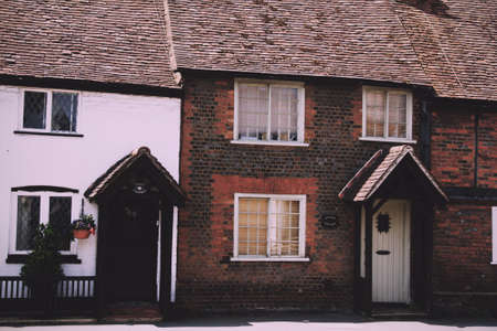 BEACONSFIELD, ENGLAND - JUNE 2016: Old terrace houses in the old town Vintage Retro Filter.のeditorial素材