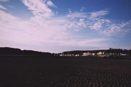 View of Bude in Cornwall from the beach Vintage Retro Filter.の写真素材