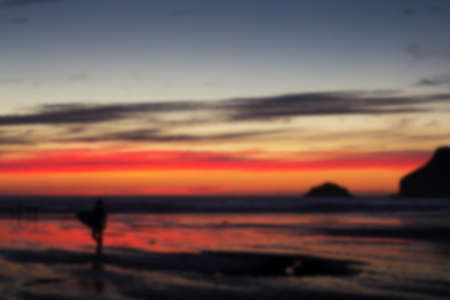 Colourful sunset over the beach at Polzeath, Cornwall Out of focus.の写真素材