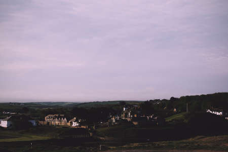 View over Bude in Cornwall from the costal path Vintage Retro Filter.の写真素材