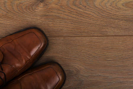 Shoes on a rustic wooden floor