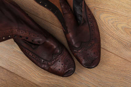 Shoes on a rustic wooden floor