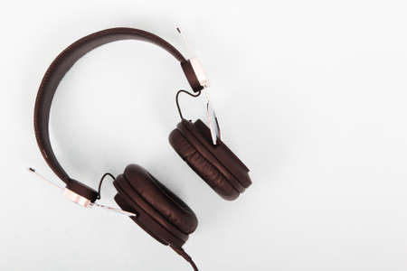 Pair of headphones against a light coloured backgroundの写真素材