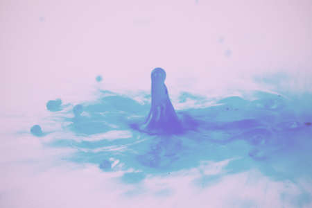 Colorful paint drop splashingの写真素材