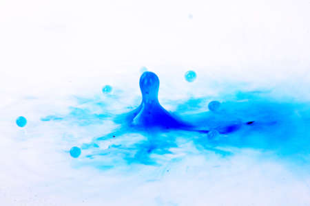 Colorful paint drop splashingの写真素材