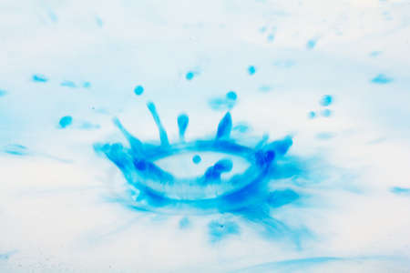 Colorful paint drop splashingの写真素材