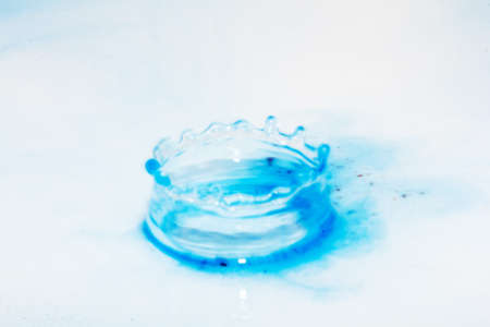 Colorful paint drop splashingの写真素材