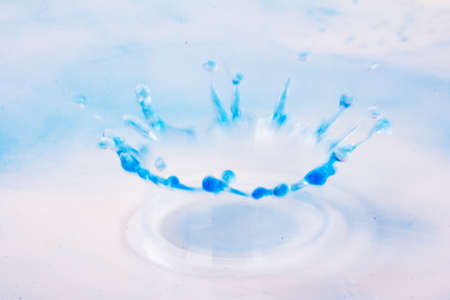 Colorful paint drop splashingの写真素材