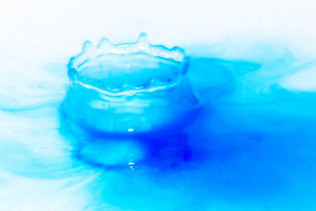 Colorful paint drop splashingの写真素材