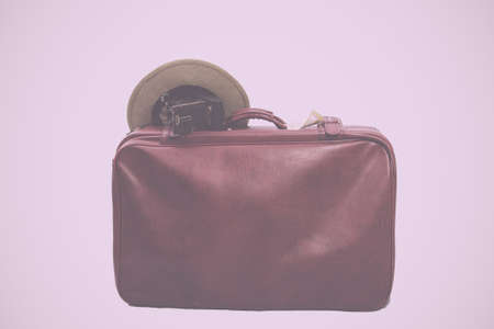 Old vintage brown leather suitcase ready for travelling Vintage Retro Filter.の写真素材