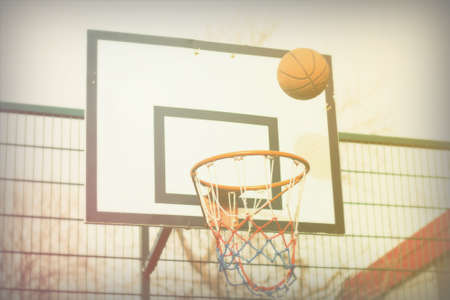 Basketball hoop outside in a school play areaの写真素材
