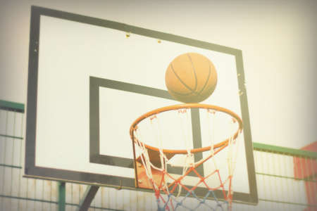 Basketball hoop outside in a school play areaの写真素材