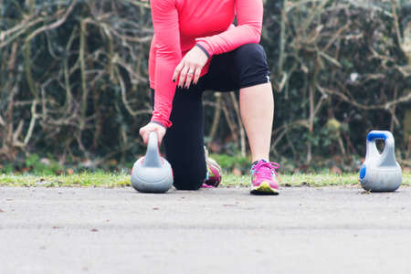 People doing keep fit exercise in the parkの写真素材