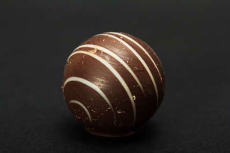 Dellicious luxury chocolate on a dark colored backgroundの写真素材