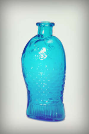 Old colourful vintage bottles against a white backgroundのeditorial素材