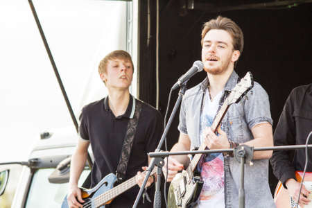 HIGH WYCOMBE, ENGLAND 1st April 2017: Performers on stage at free public music festivalのeditorial素材