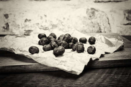 Fresh blueberries on a rustic paper backgroundの写真素材