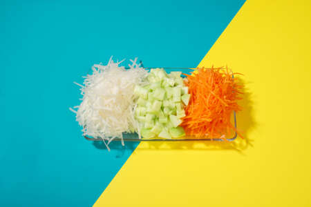 minced or grated fruit mix in a transparent containerの写真素材