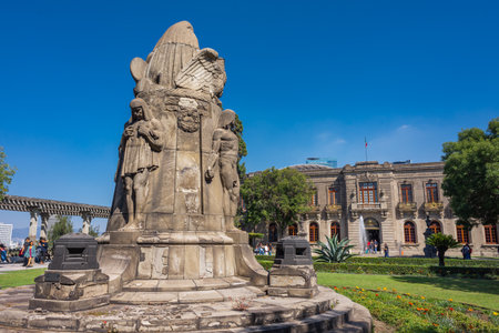Departure from the National Museum of Chapultepec in the castle with a group of tourists leaving the garden with sculptures and water fountainsのeditorial素材