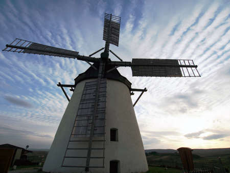 Atmospheric sky behind fully operational windwill in Retz (Austria)の写真素材