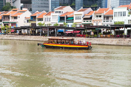 The skyline and cityscape along Singapore River in Singaporeのeditorial素材
