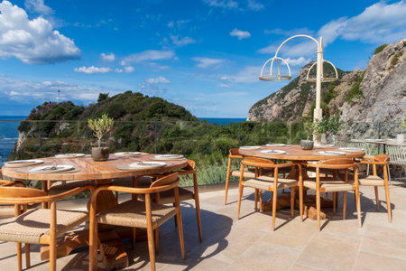 Best view in Paleokastritsa village on the the island of Corfu in Greece from table in a restaurant near the monasteryの写真素材