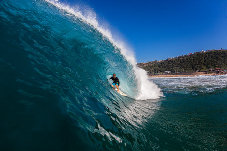 Surfer Tube Riding Hollow Waveのeditorial素材