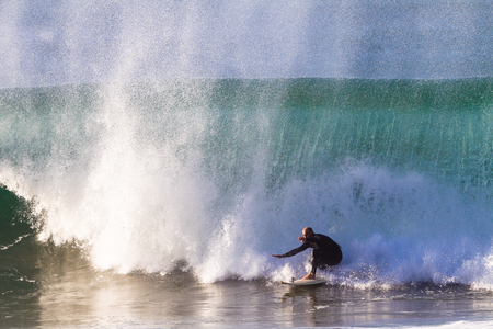 Surfer Escapes Crashing Wave