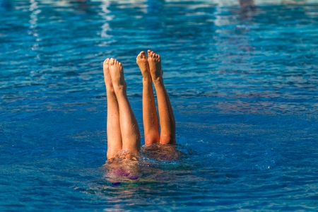 Aquatic synchronized swimming pairs girls finals dance program at the nationals championshipsの写真素材
