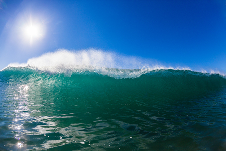 Ocean wave water lip crashing towards swimmers view with detail texture and power の写真素材