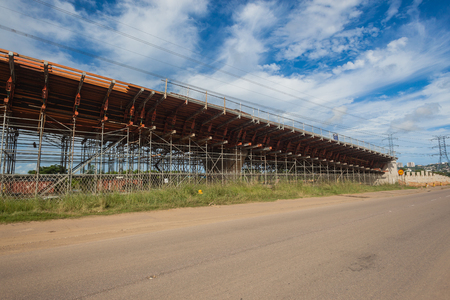 Steel metal scaffolding support structures mounted for concrete mould pouring on road civil engineering construction の写真素材