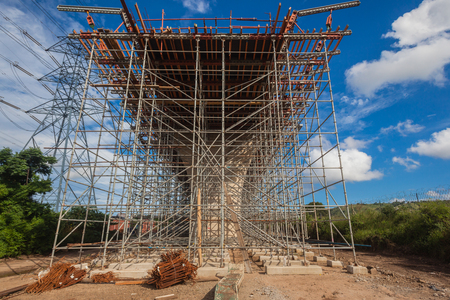 Steel metal scaffolding support structures mounted for concrete mould pouring on road civil engineering construction の写真素材