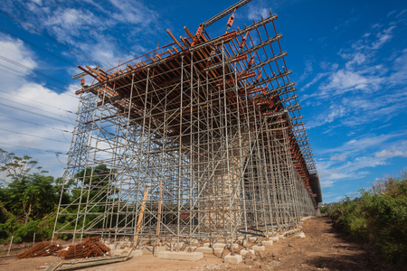 Steel metal scaffolding support structures mounted for concrete mould pouring on road civil...