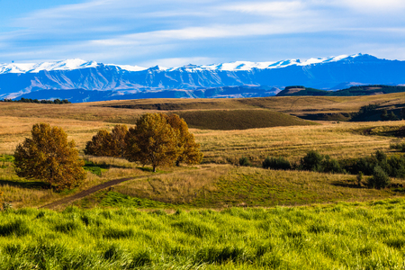 Rural countryside landscape beauty in the grass green mountain terrainの写真素材